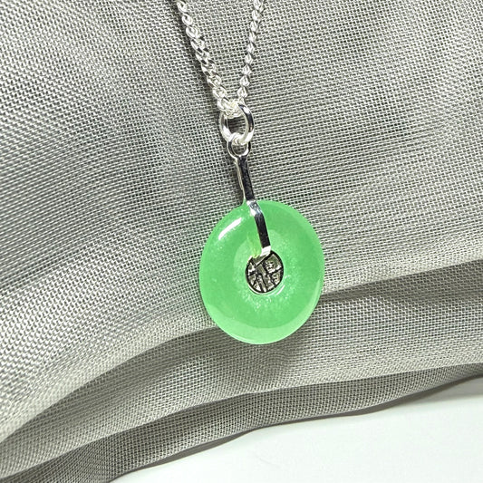 Real green jade necklace with a round pendant sterling silver and a chain