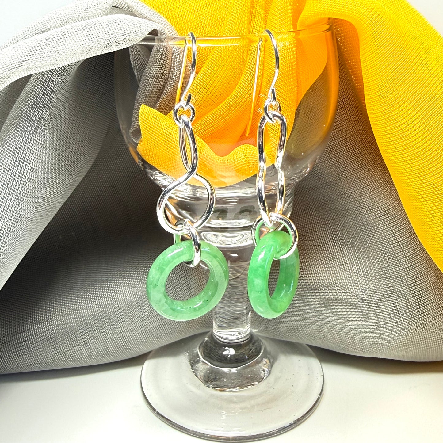 Real green jade sterling silver looped dangling dropped earrings, rounded shape