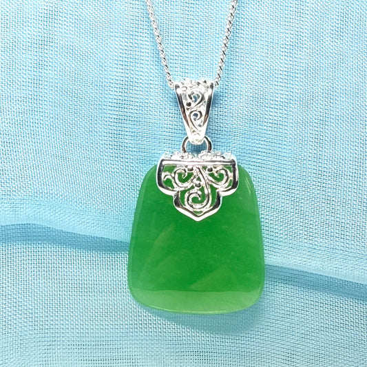 Real green jade stone, large cushion shaped pendant with solid chain and box included as well