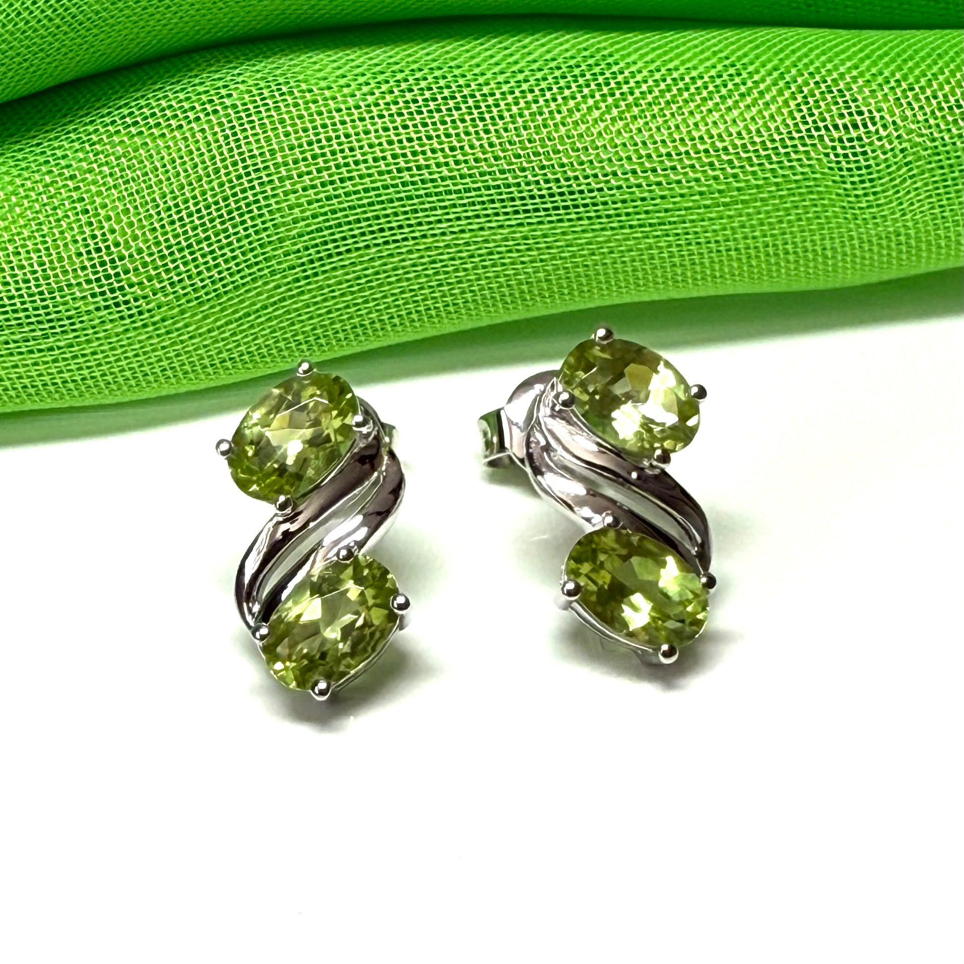 Real green peridot stud dropped earrings fancy double swirl oval stones