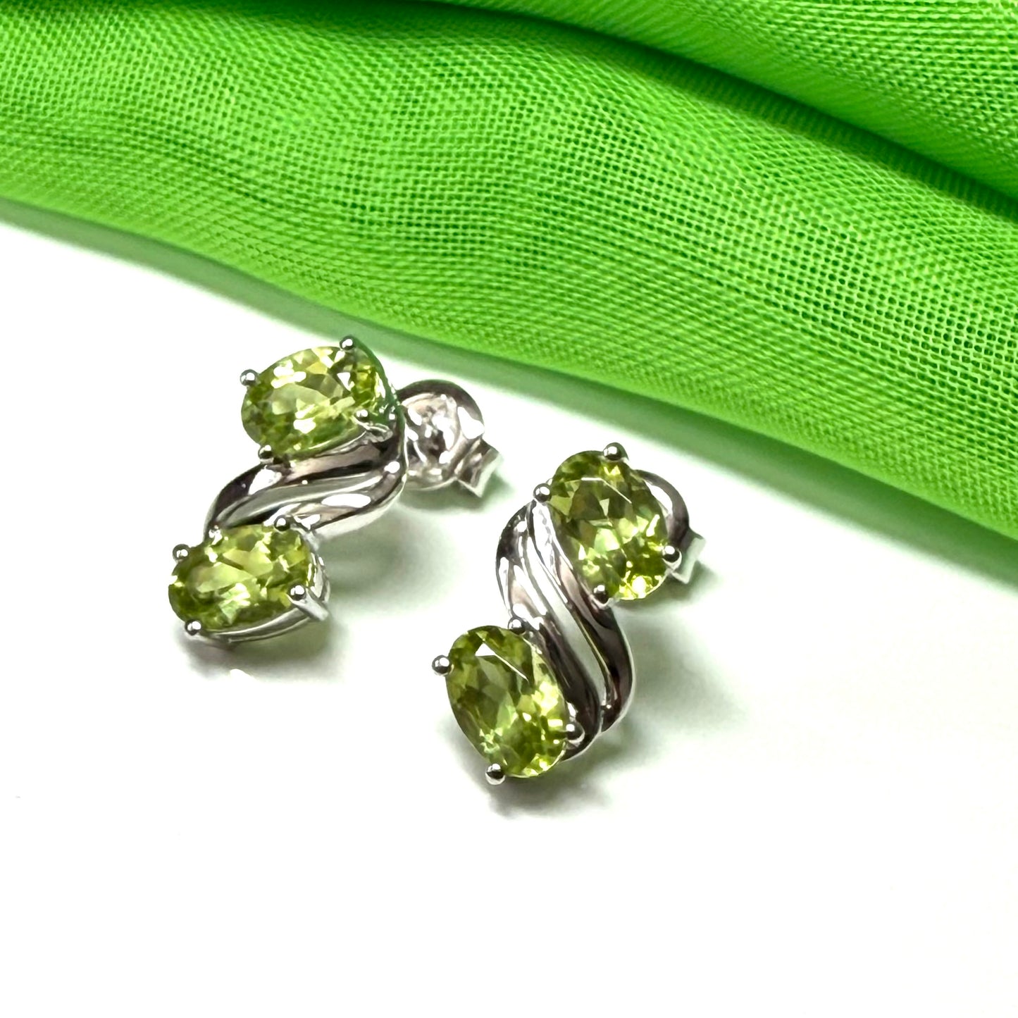 Real green peridot stud dropped earrings fancy double swirl oval stones