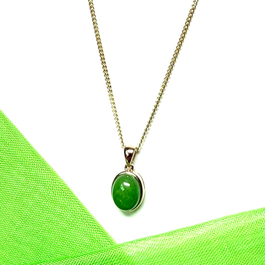 Real jade oval shaped green necklace yellow gold pendant