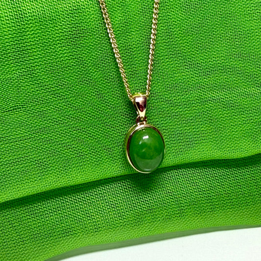 Real jade oval shaped green necklace yellow gold pendant
