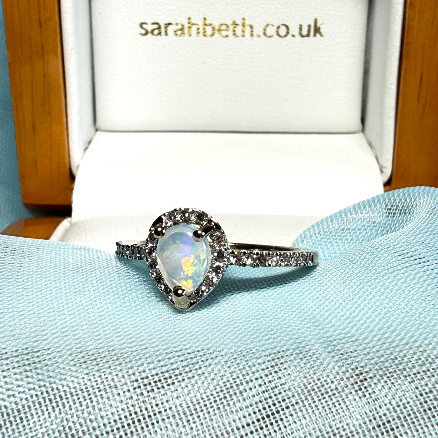 Real opal and real diamond yellow gold pear shaped cluster ring