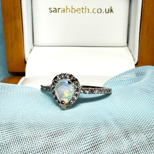 Real opal and real diamond yellow gold pear shaped cluster ring