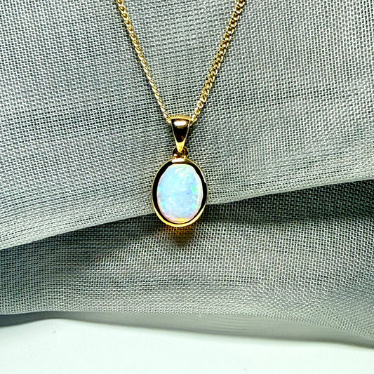 Real opal necklace yellow gold oval pendant smooth rubbed over smooth setting
