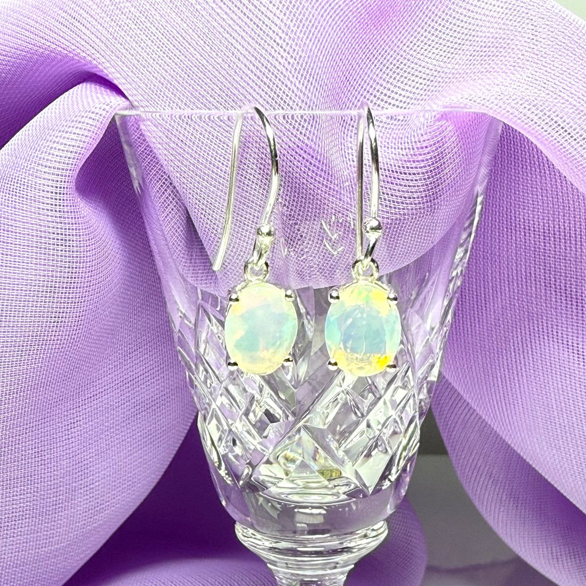 Real opal sterling silver oval shaped drop earrings