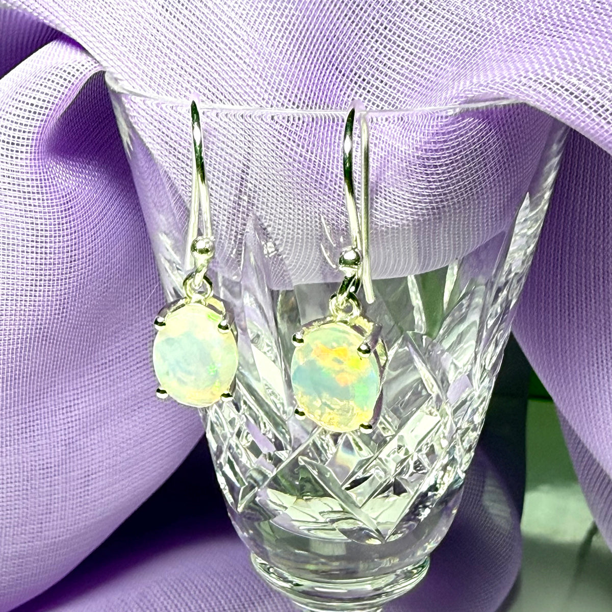 Real opal sterling silver oval shaped drop earrings