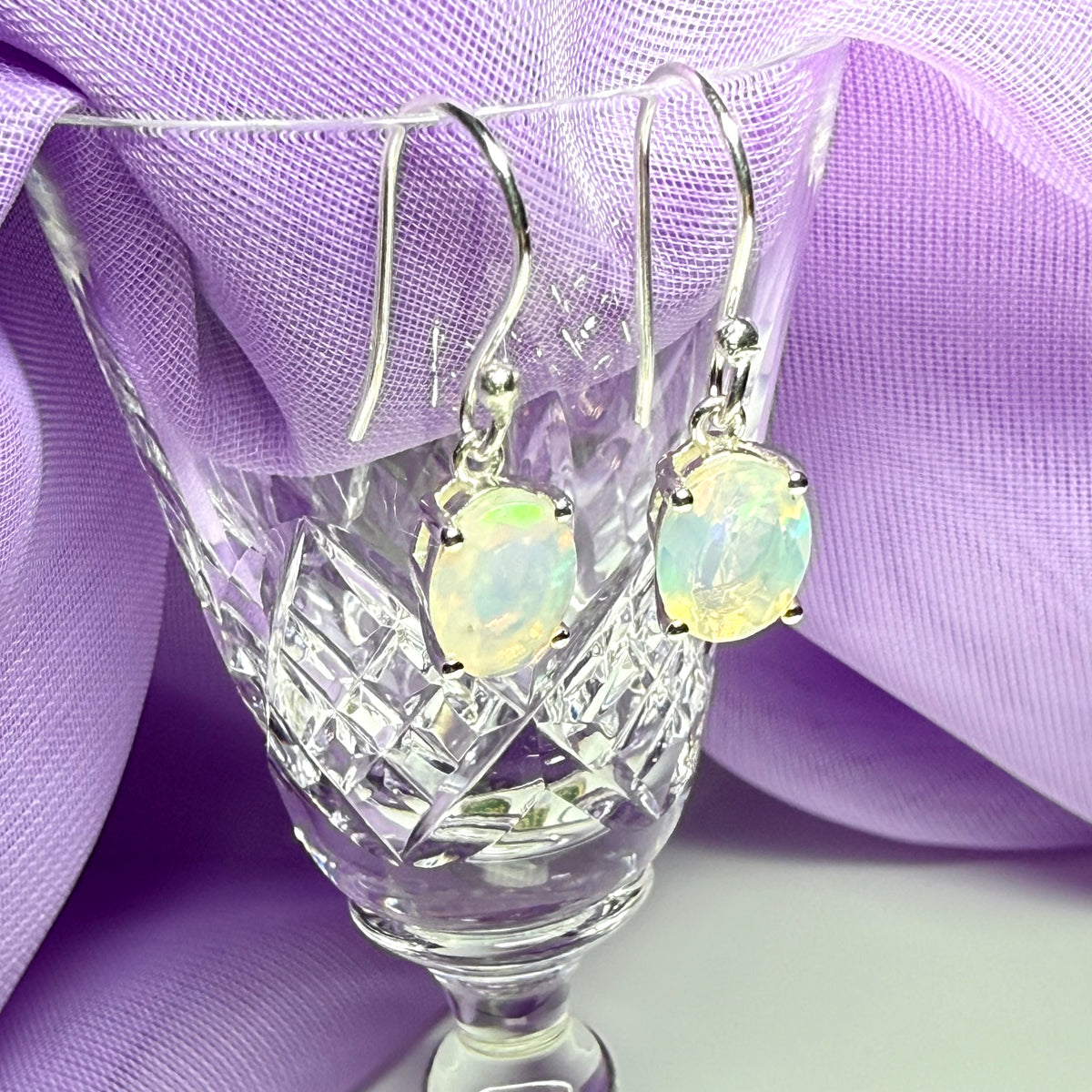 Real opal sterling silver oval shaped drop earrings