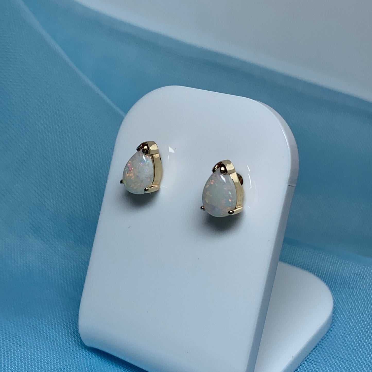 Real opal yellow gold pear shaped stud earrings