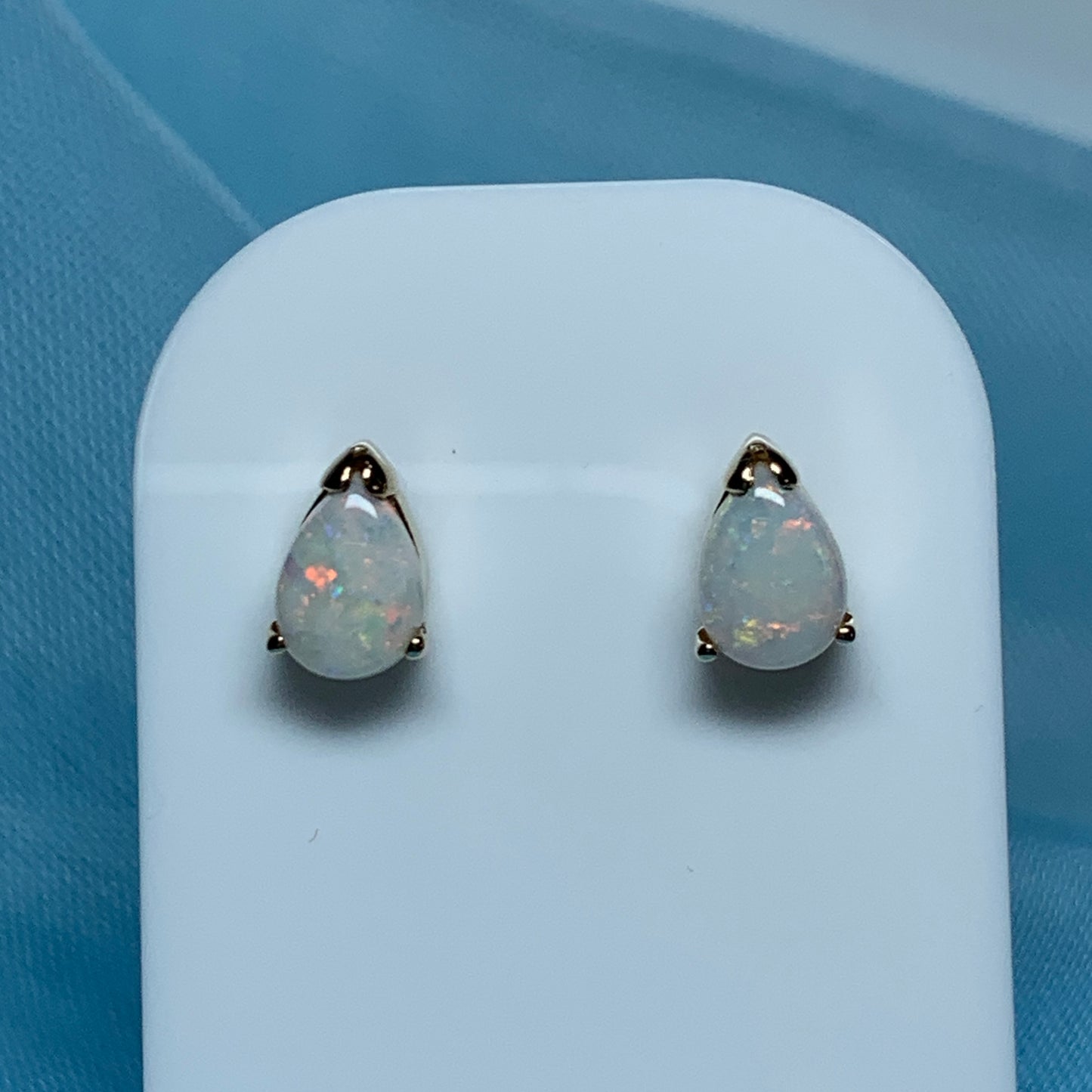 Real opal yellow gold pear shaped stud earrings