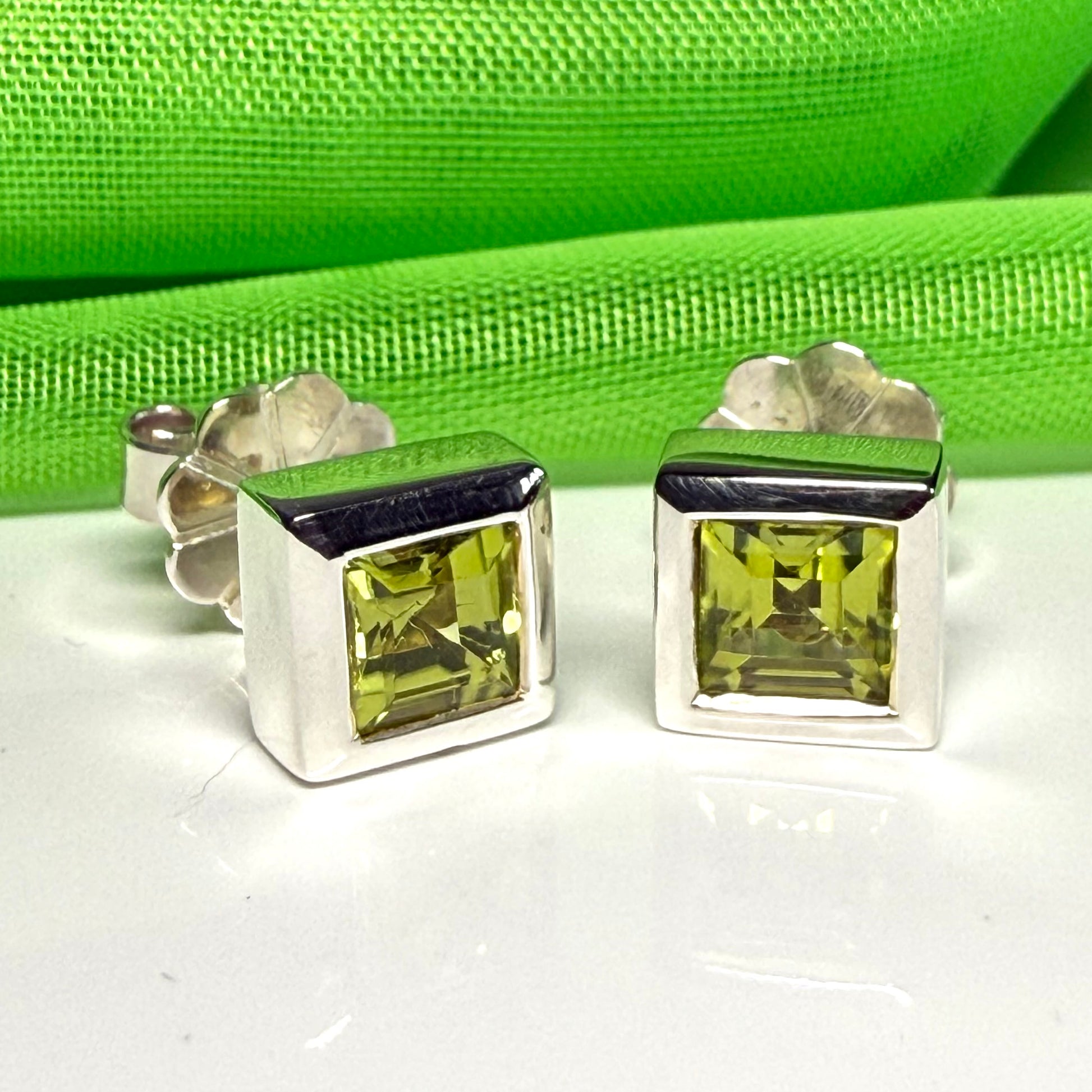 Real peridot square stud earrings rubbed over edged