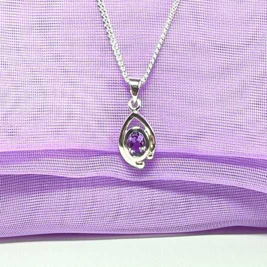 Real purple amethyst oval shaped sterling silver necklace with a smooth rubbed over pierced pendant with chain