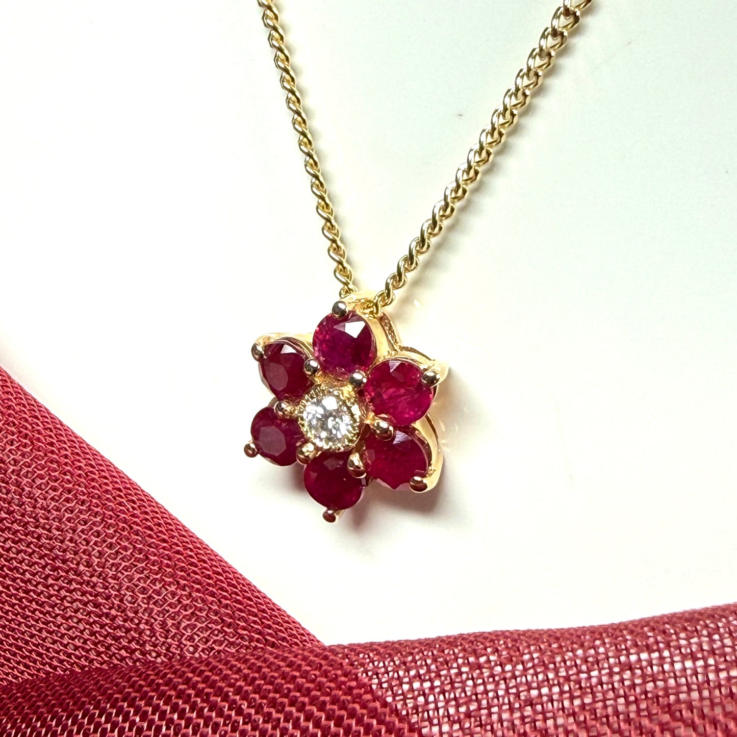 Real red ruby and diamond yellow gold fancy daisy shaped cluster necklace