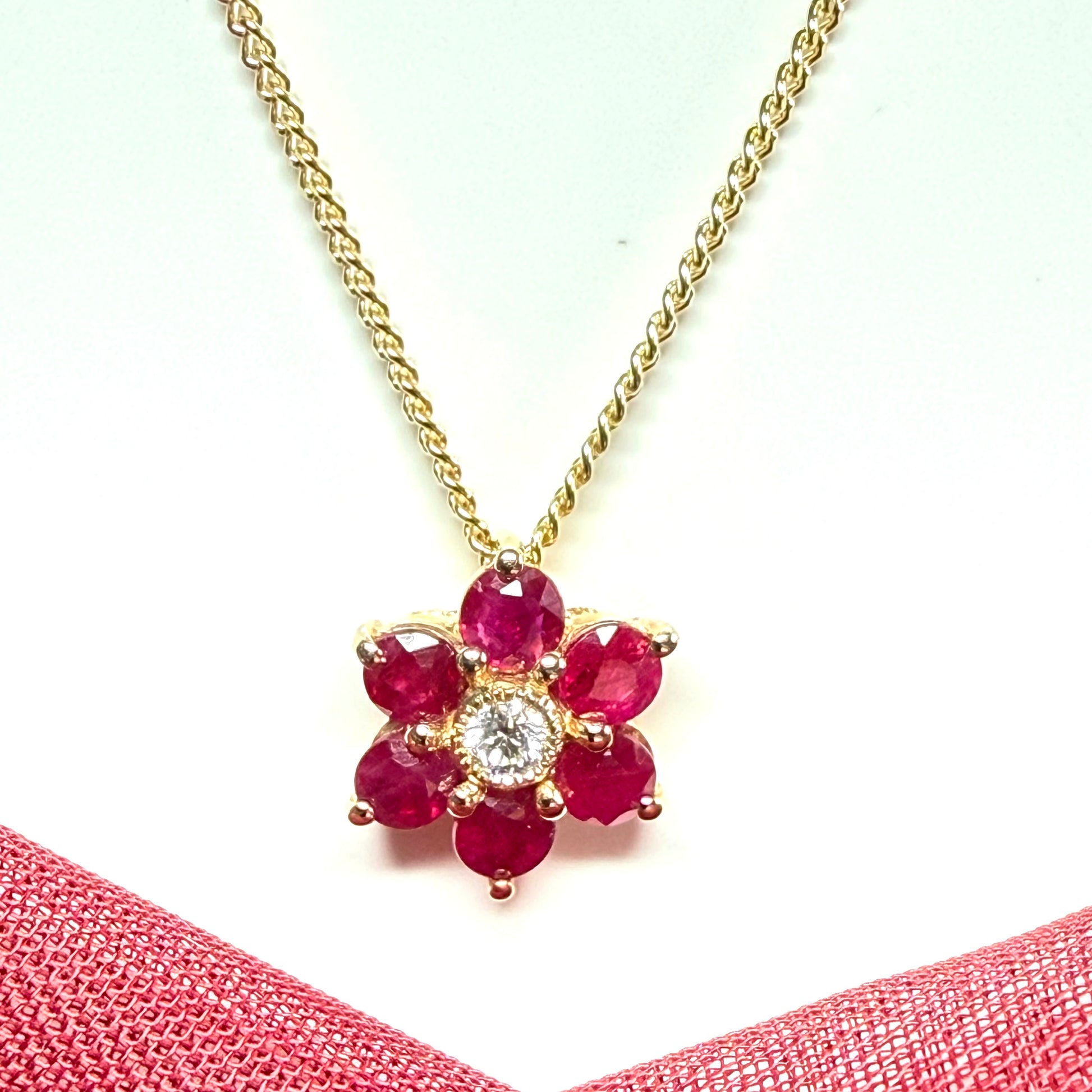 Real red ruby and diamond yellow gold fancy daisy shaped cluster necklace