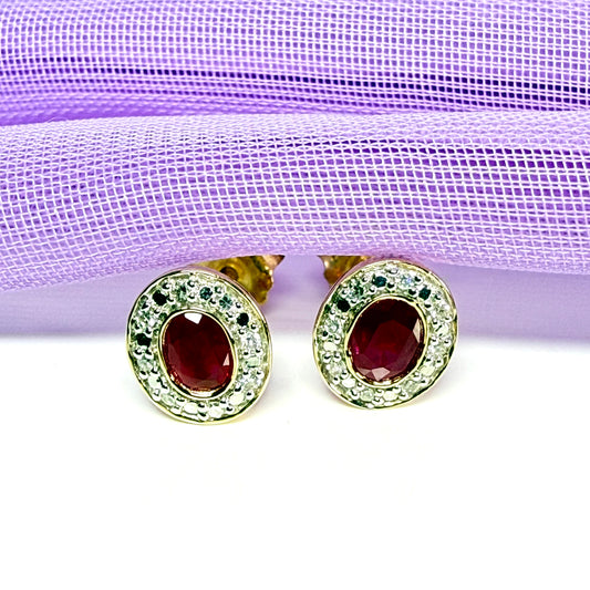 Real ruby and diamond oval shaped cluster stud earrings yellow gold
