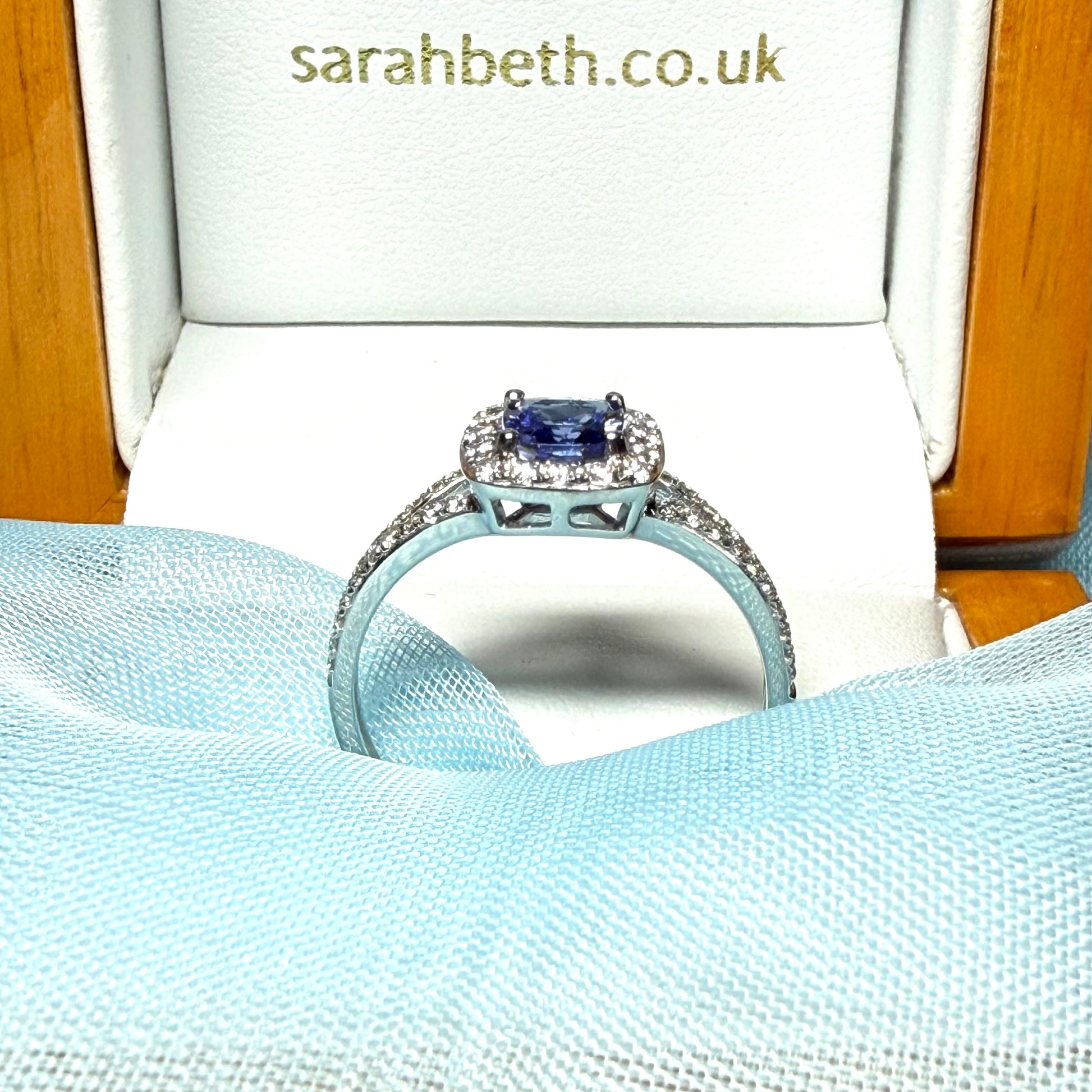 Real tanzanite and diamond white gold square cluster ring split shoulders cushion shape