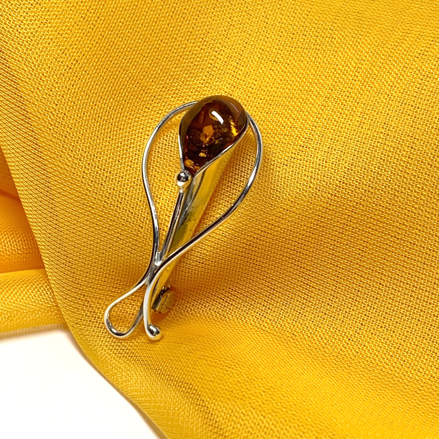 Real amber brooch sterling silver fancy swirl