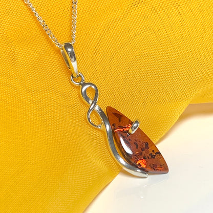 Real amber fancy swirl necklace sterling silver