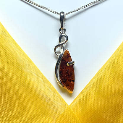 Real amber fancy swirl necklace sterling silver