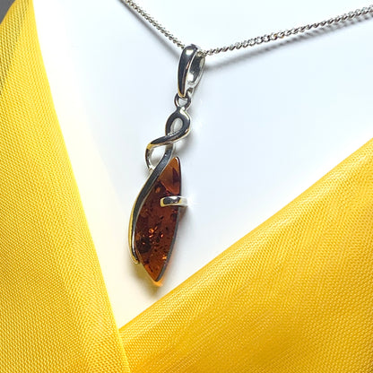 Real amber fancy swirl necklace sterling silver