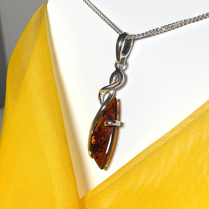 Real amber fancy swirl necklace sterling silver