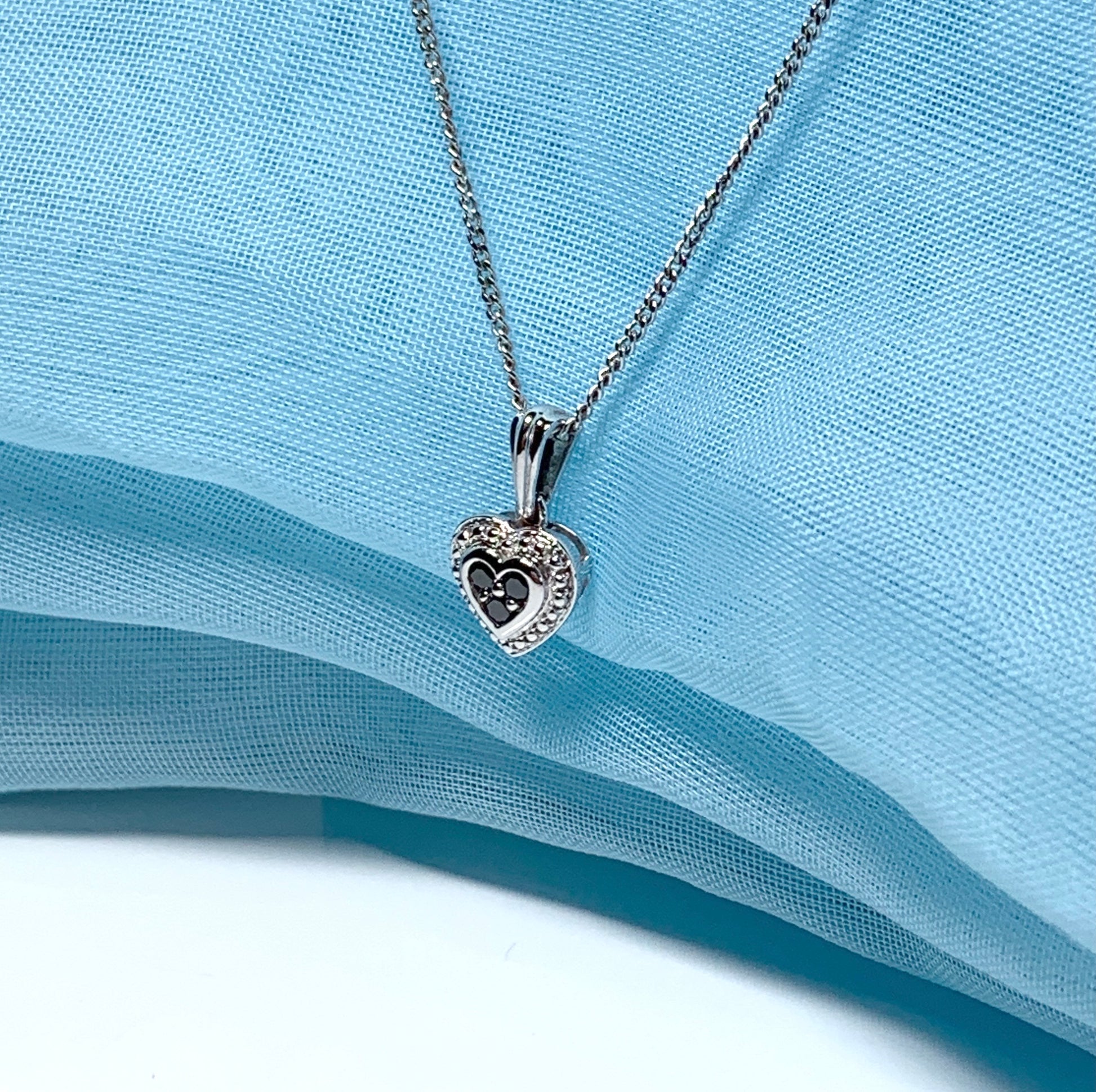 Real black and white diamond heart shaped white gold necklace pendant