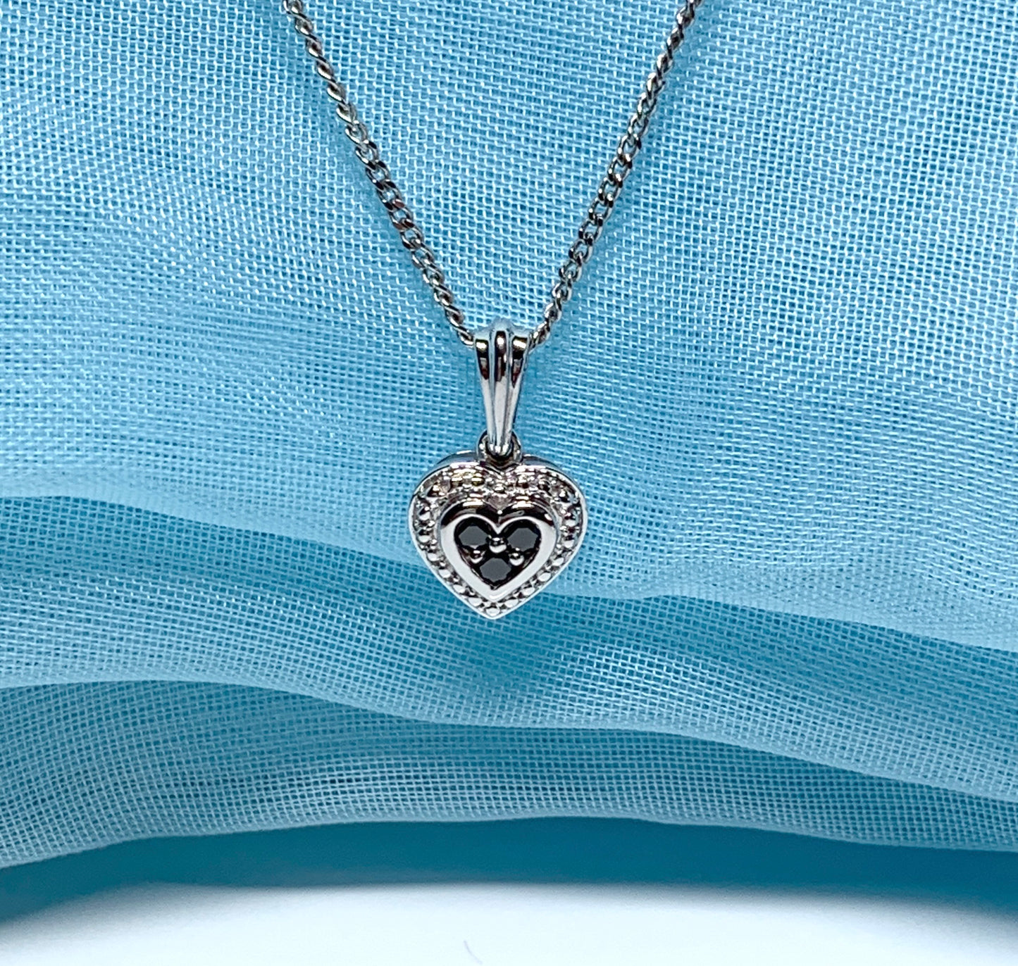 Real black and white diamond heart shaped white gold necklace pendant