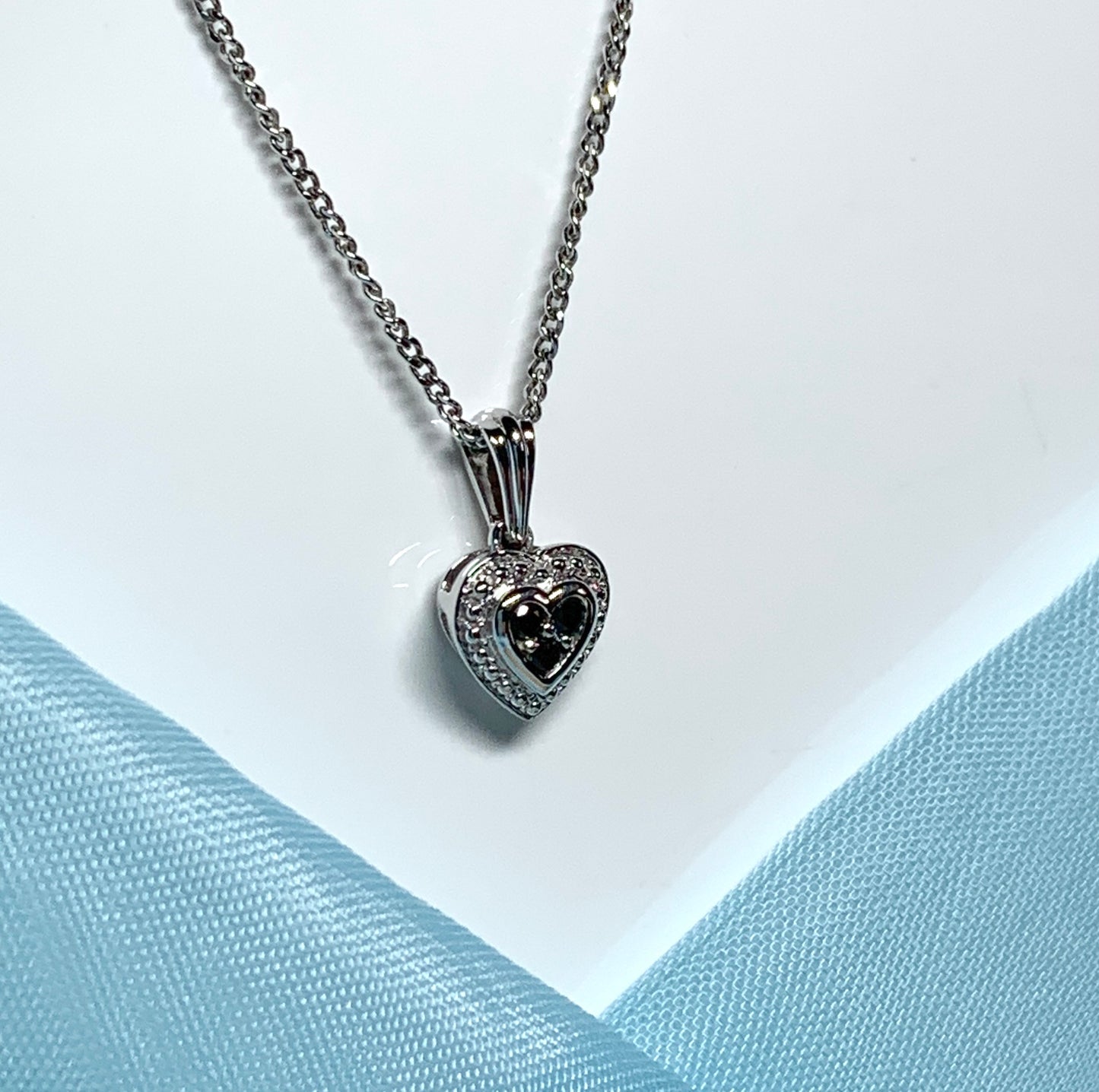 Real black and white diamond heart shaped white gold necklace pendant