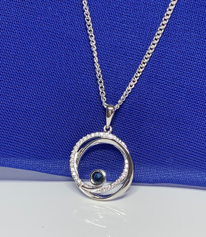 Real blue sapphire and cubic zirconia round necklace swirl pendant