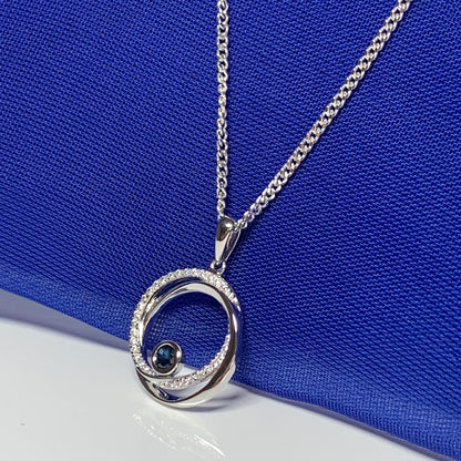 Real blue sapphire and cubic zirconia round necklace swirl pendant