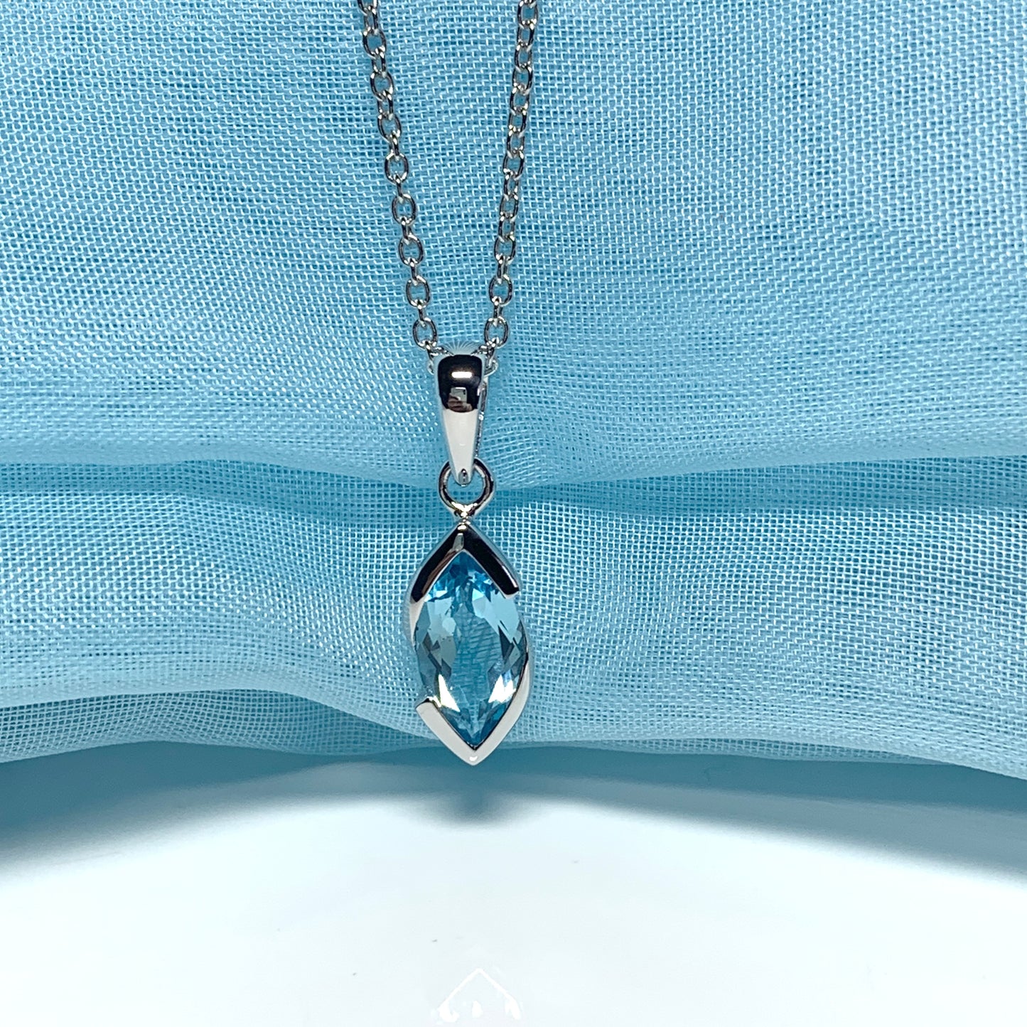 Real blue topaz necklace pendant marquise smooth rubbed over setting