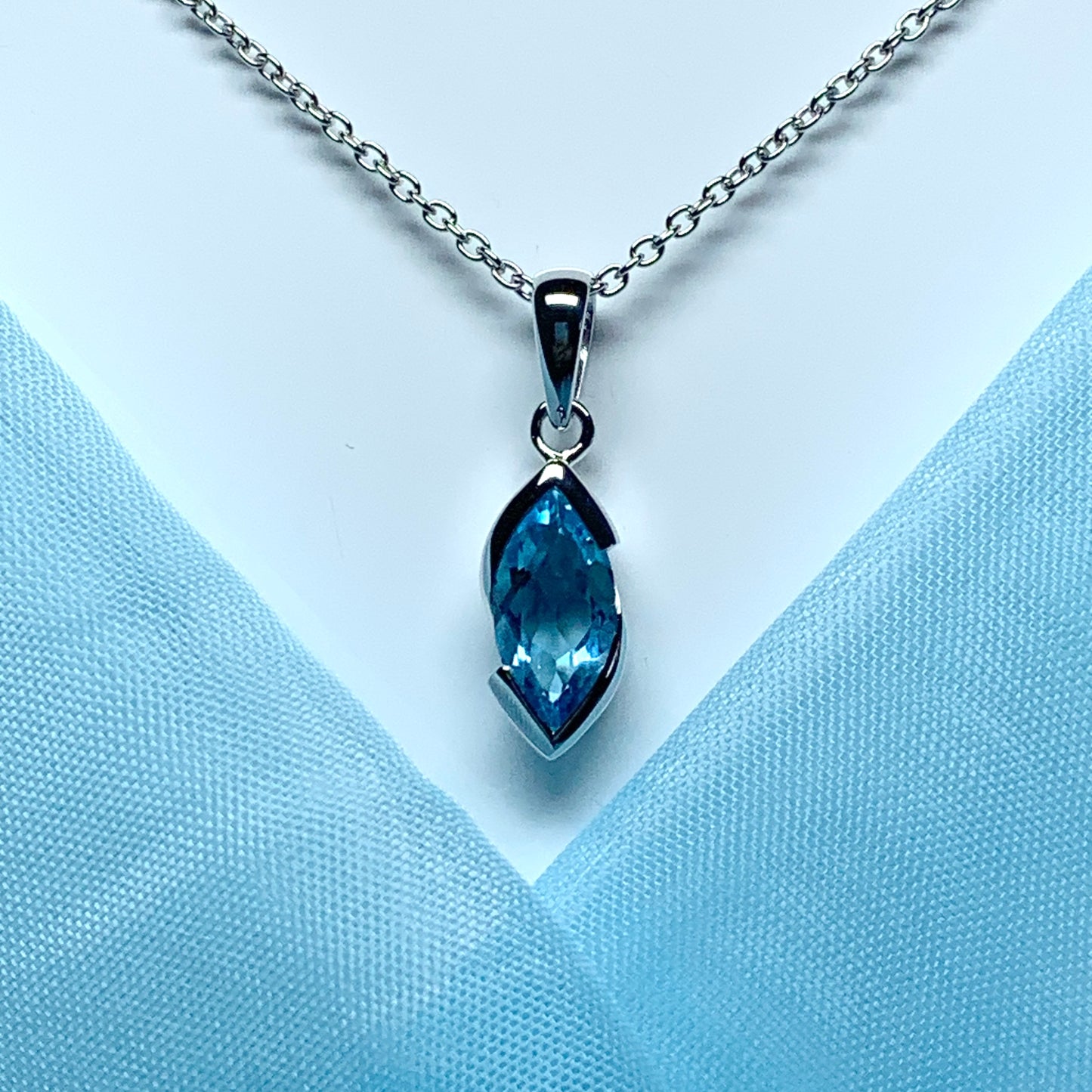 Real blue topaz necklace pendant marquise smooth rubbed over setting