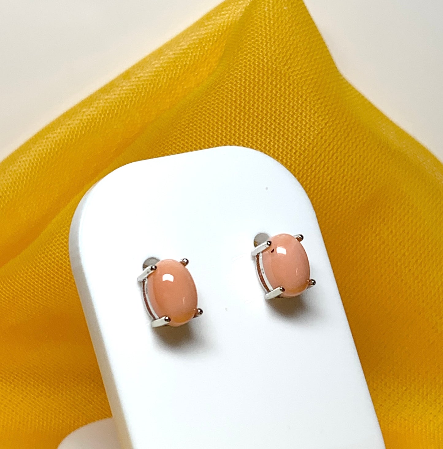 Real coral oval stud earrings white gold