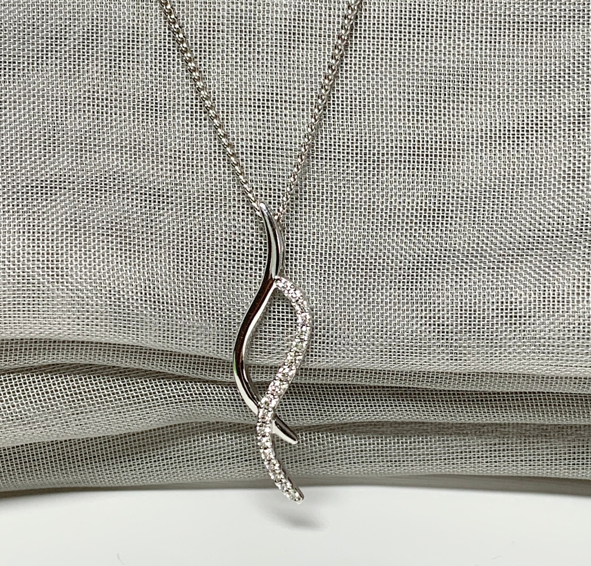 Real diamond necklace white gold open fancy swirl pendant