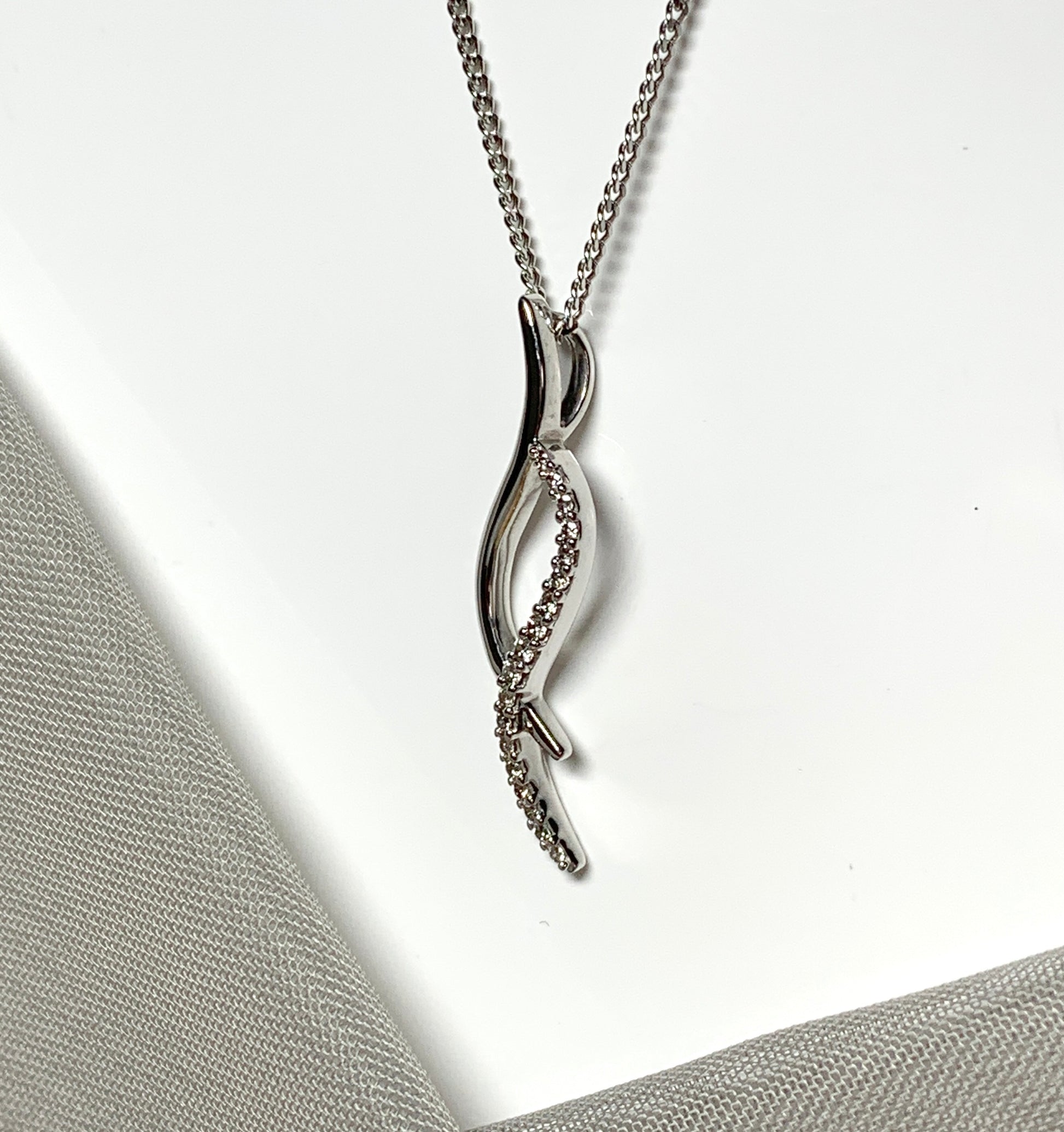 Real diamond necklace white gold open fancy swirl pendant