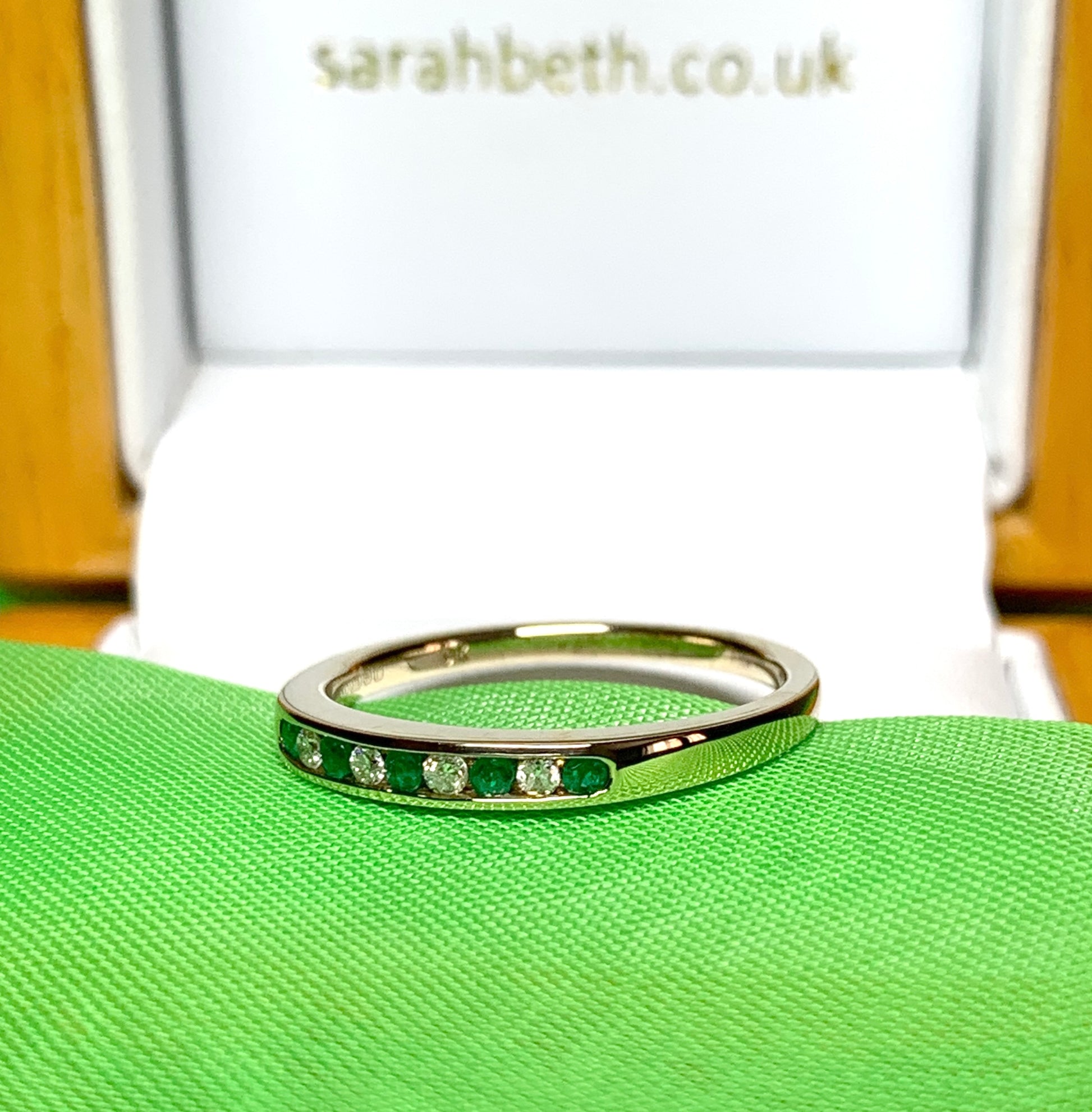 Green real emerald and diamond yellow gold channel set eternity ring