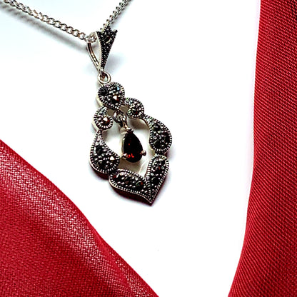 Real garnet and marcasite open pierced silver necklace