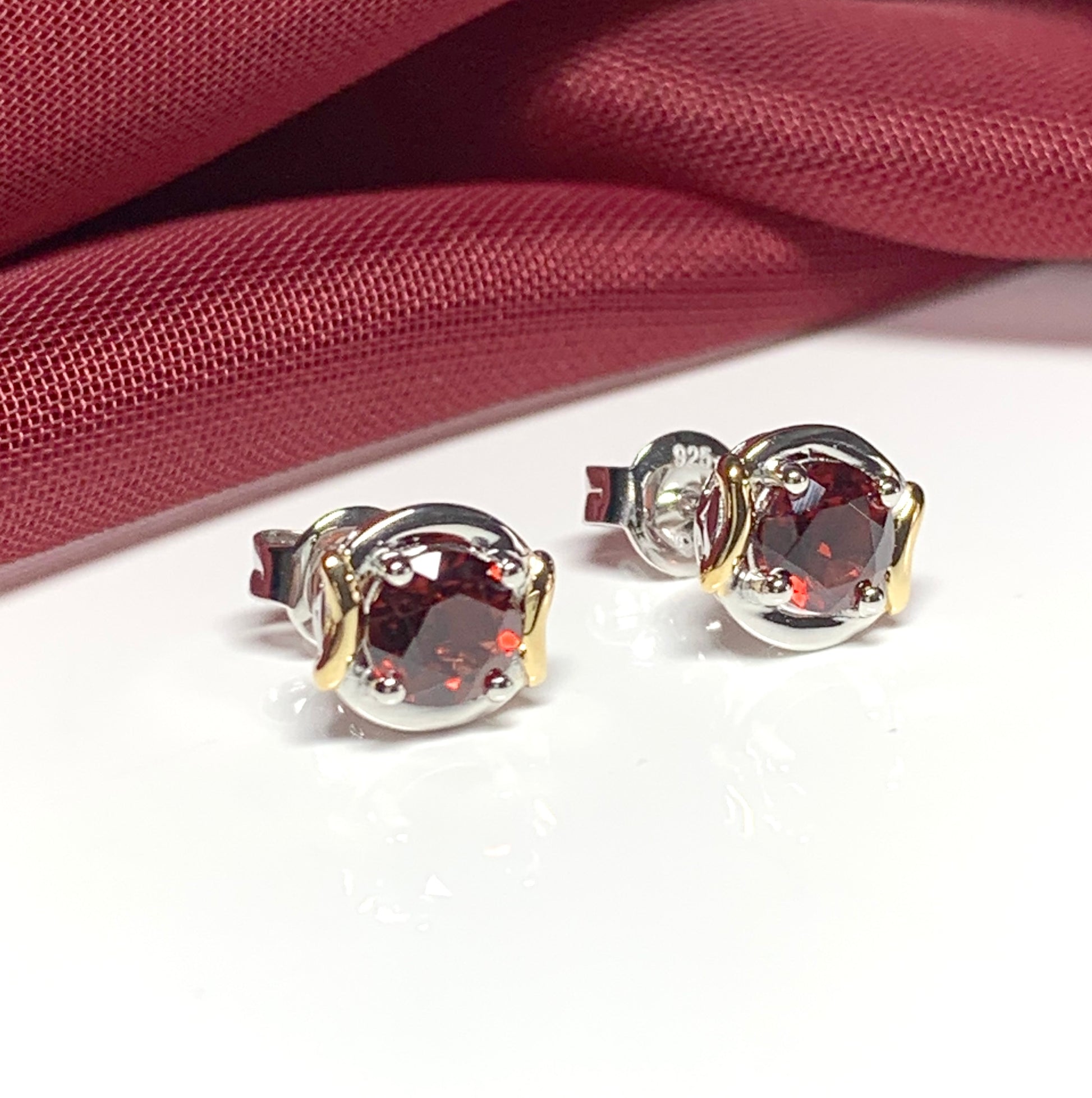 Garnet two tone sterling silver and silver gilt round stud earrings