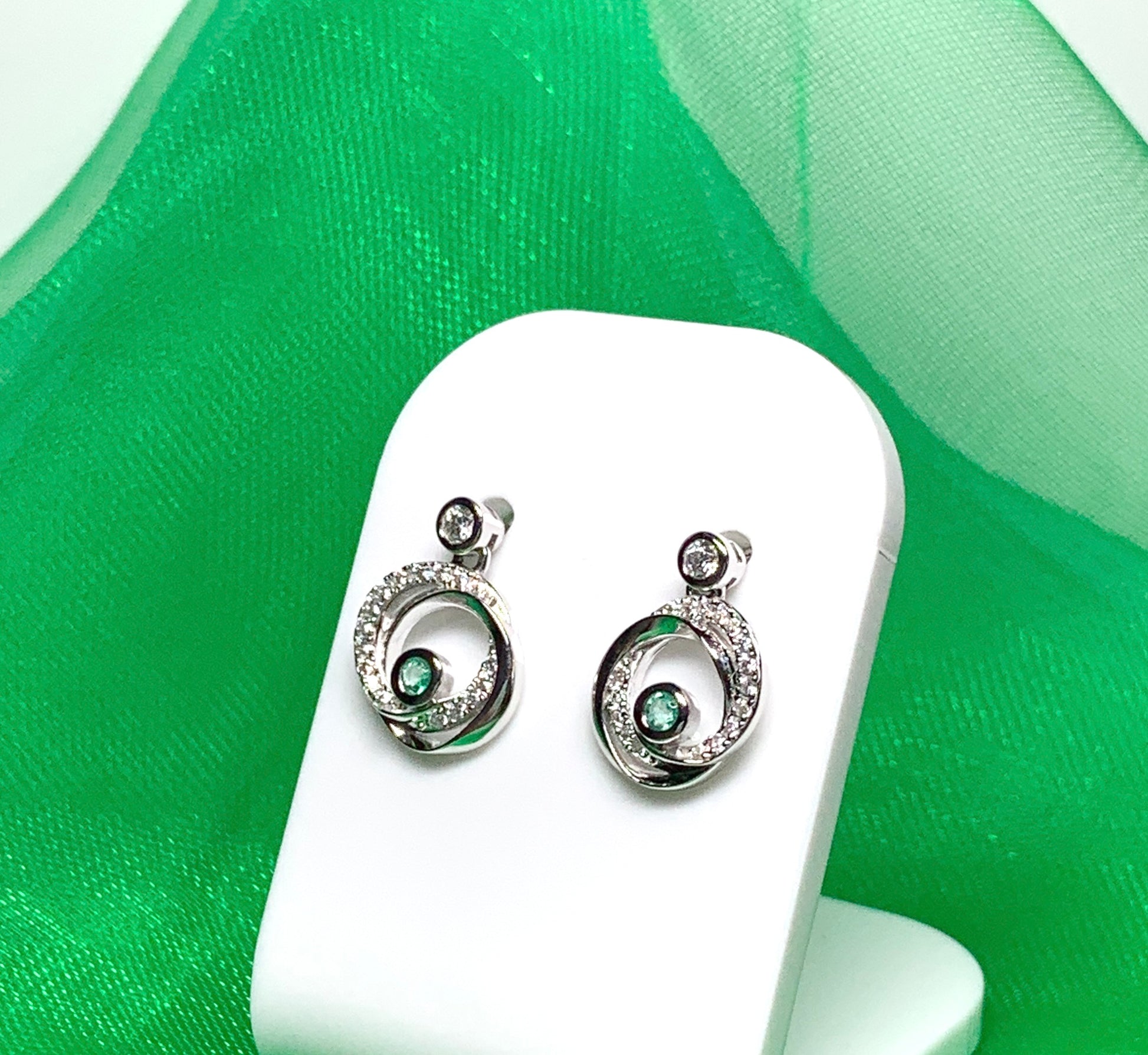 Real green emerald and cubic zirconia round swirl stud earrings