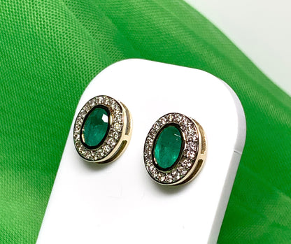 Real green emerald and diamond yellow gold oval cluster stud earrings