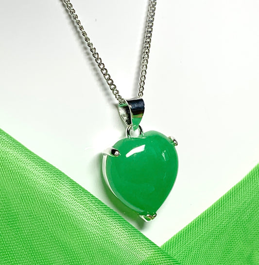 A real green jade necklace heart shape sterling silver pendant including chain