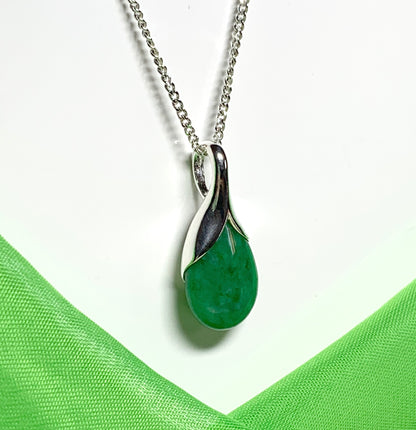 Real green jade necklace in a pear or tear drop shaped sterling silver pendant