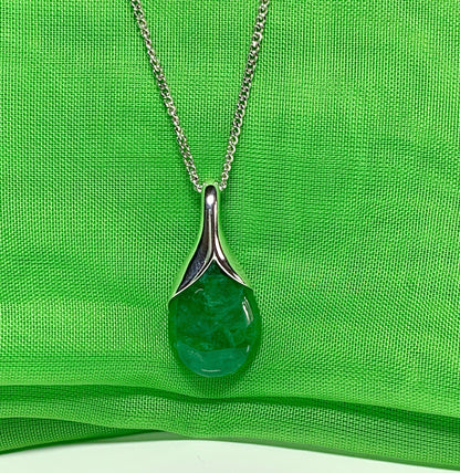 Real green jade necklace in a pear shaped sterling silver pendant