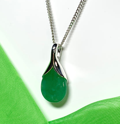 Real green jade necklace in a pear shaped sterling silver teardrop shape