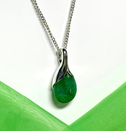 Real green jade necklace in a pear shaped sterling silver pendant