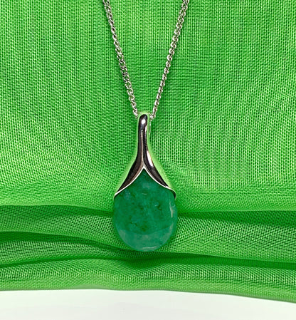 Real green jade necklace in a pear or tear drop shaped sterling silver pendant