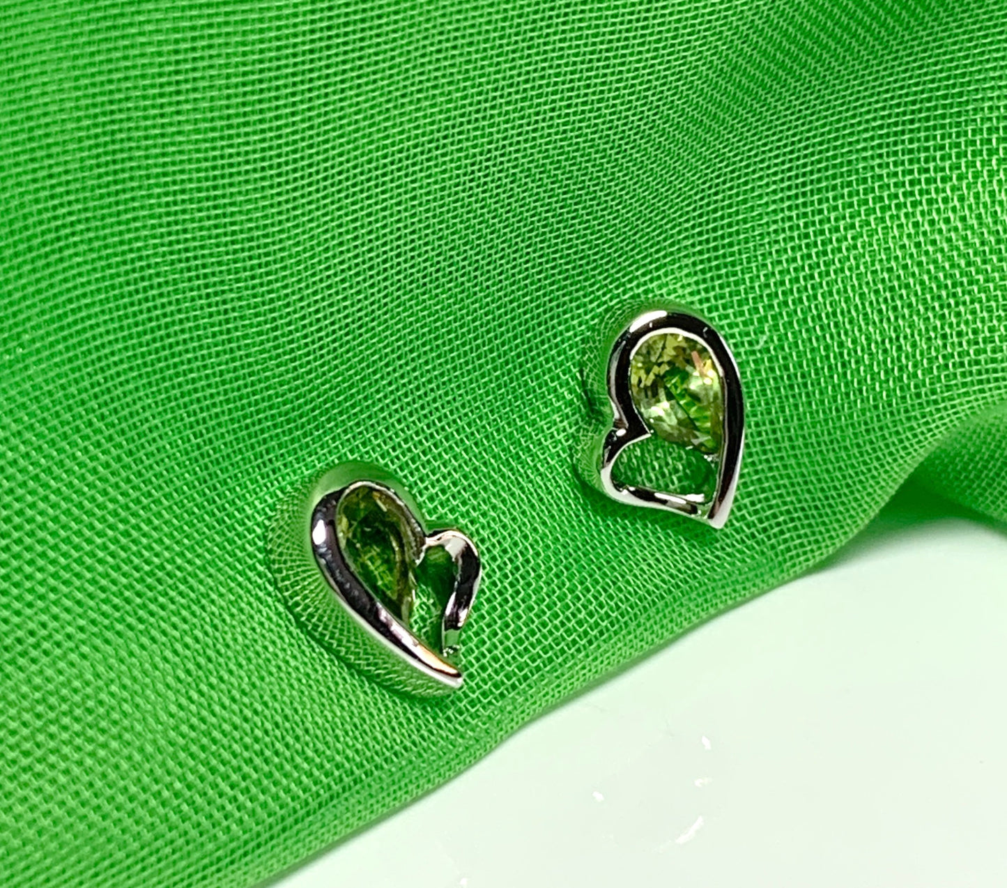 Real green peridot heart shaped stud earrings sterling silver