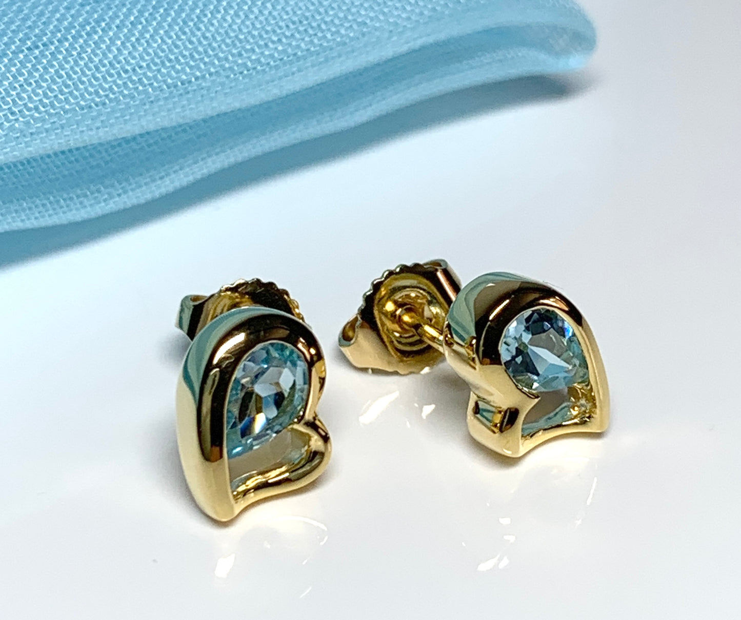 Real light blue topaz heart shaped stud earrings gold plated sterling silver gilt