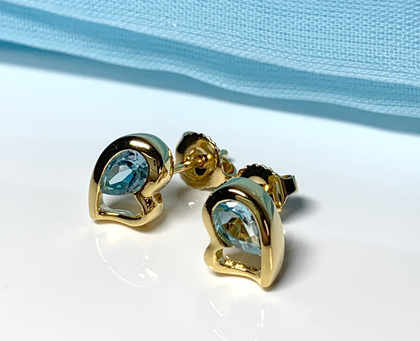 Real light blue topaz heart shaped stud earrings gold plated sterling silver gilt